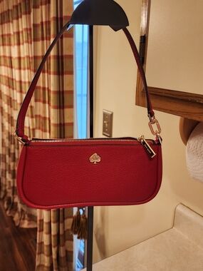 Kate Spade New York Kayla small pebbled leather top-zip convertible wristlet